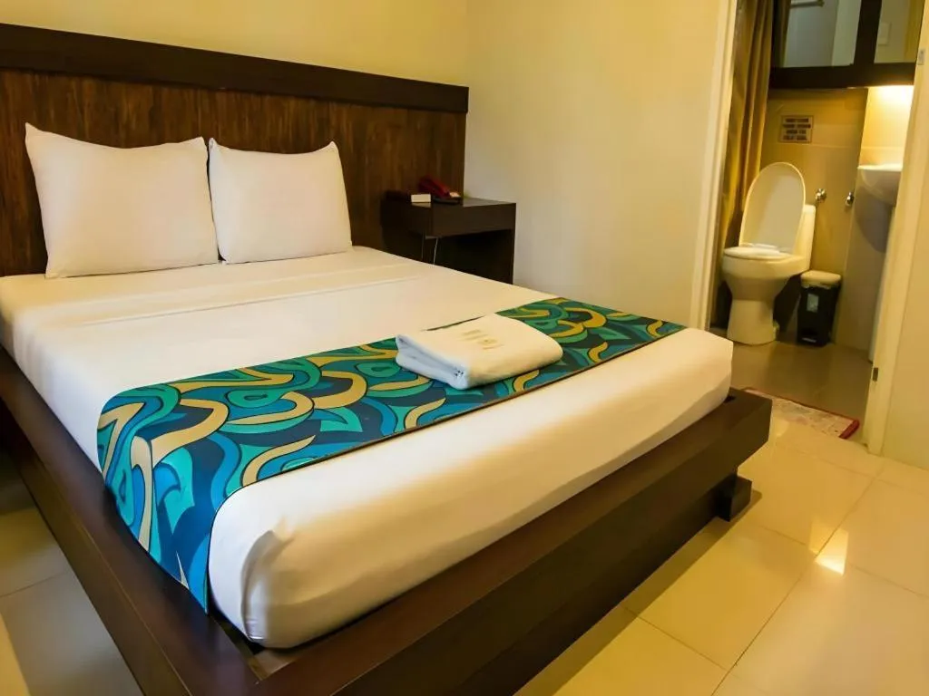 Bed in Driggs Pension House