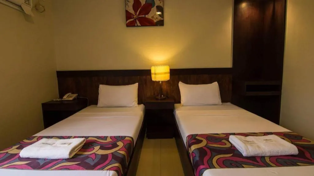 Bed in Driggs Pension House