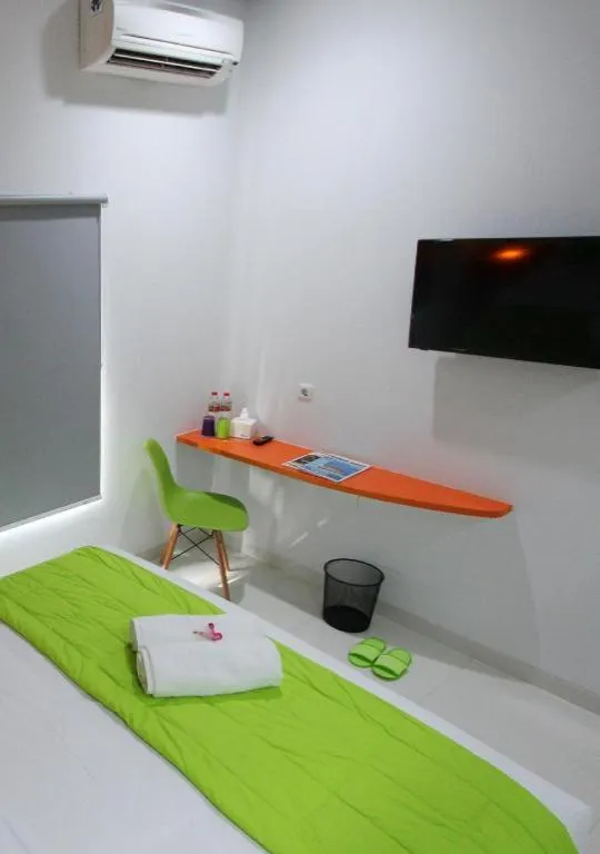 Bed in Fizz Hotel Lombok