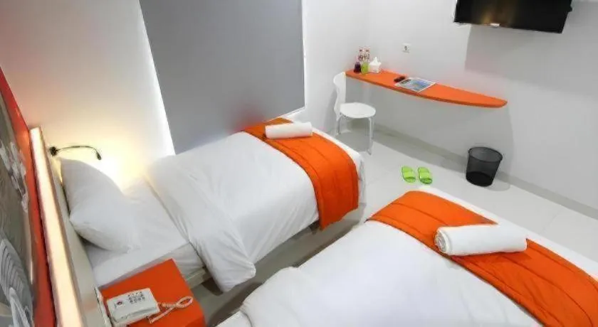 Bed in Fizz Hotel Lombok