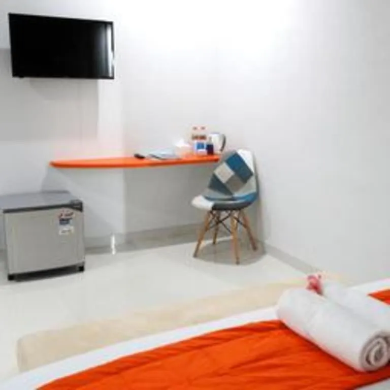 Bed in Fizz Hotel Lombok