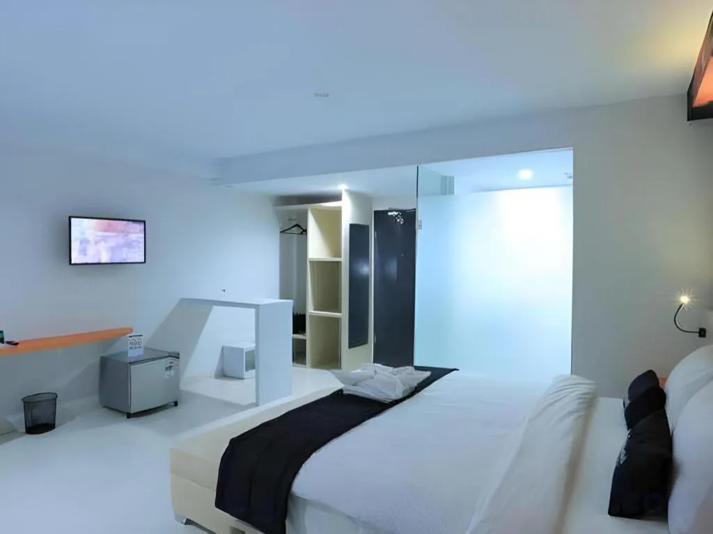 Bed in Fizz Hotel Lombok