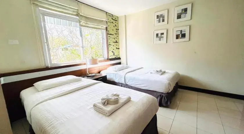 Bed in Huern Che Ta One Hotel Bed in Huern Che Ta One Hotel