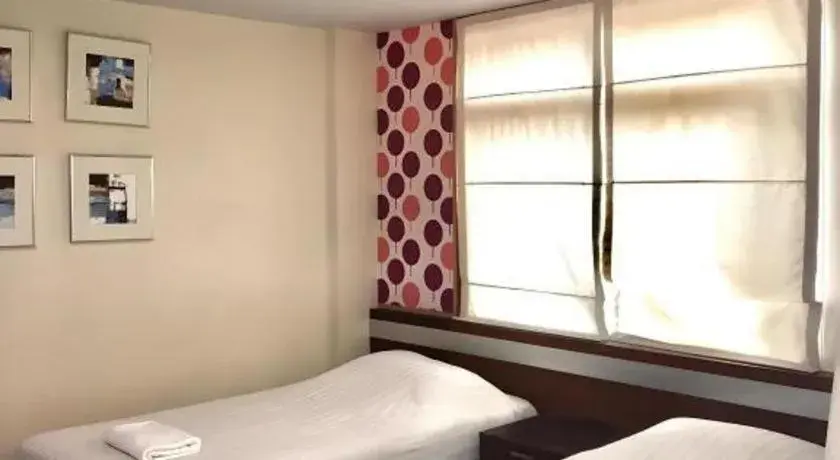 Bed in Huern Che Ta One Hotel Bed in Huern Che Ta One Hotel