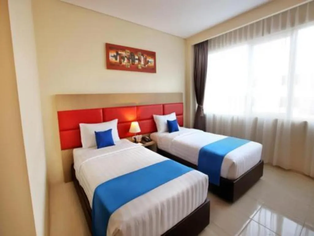 Bed in Asoka Luxury Hotel