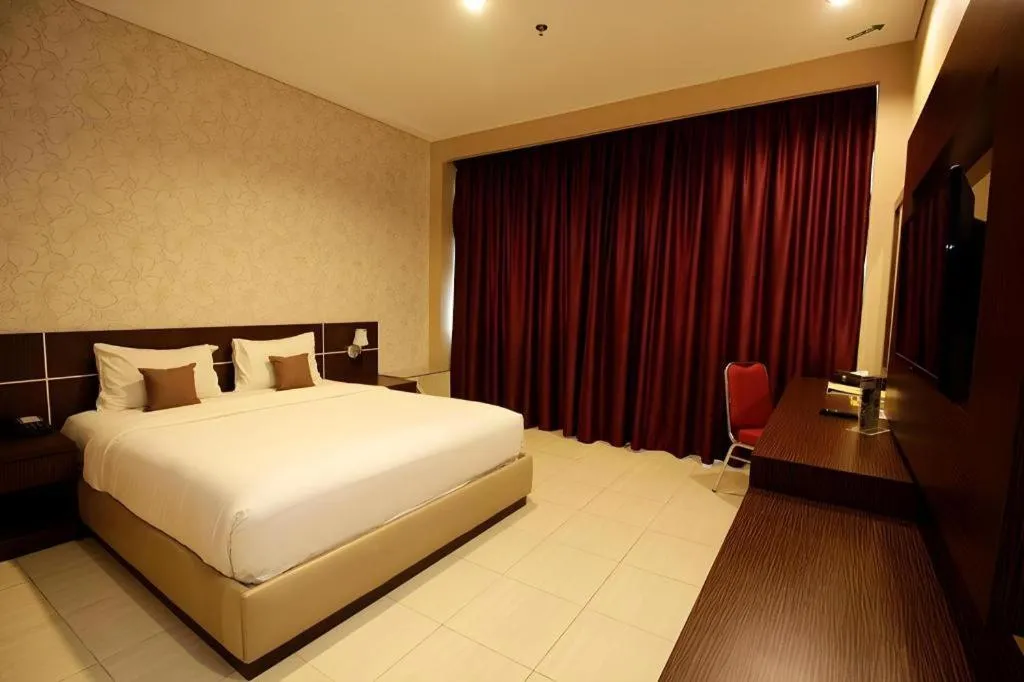 Bed in Asoka Luxury Hotel