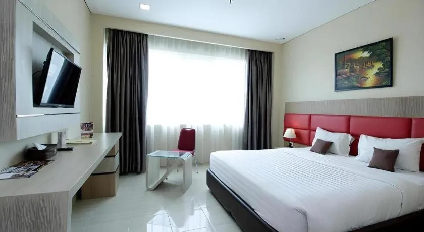 Bed in Asoka Luxury Hotel