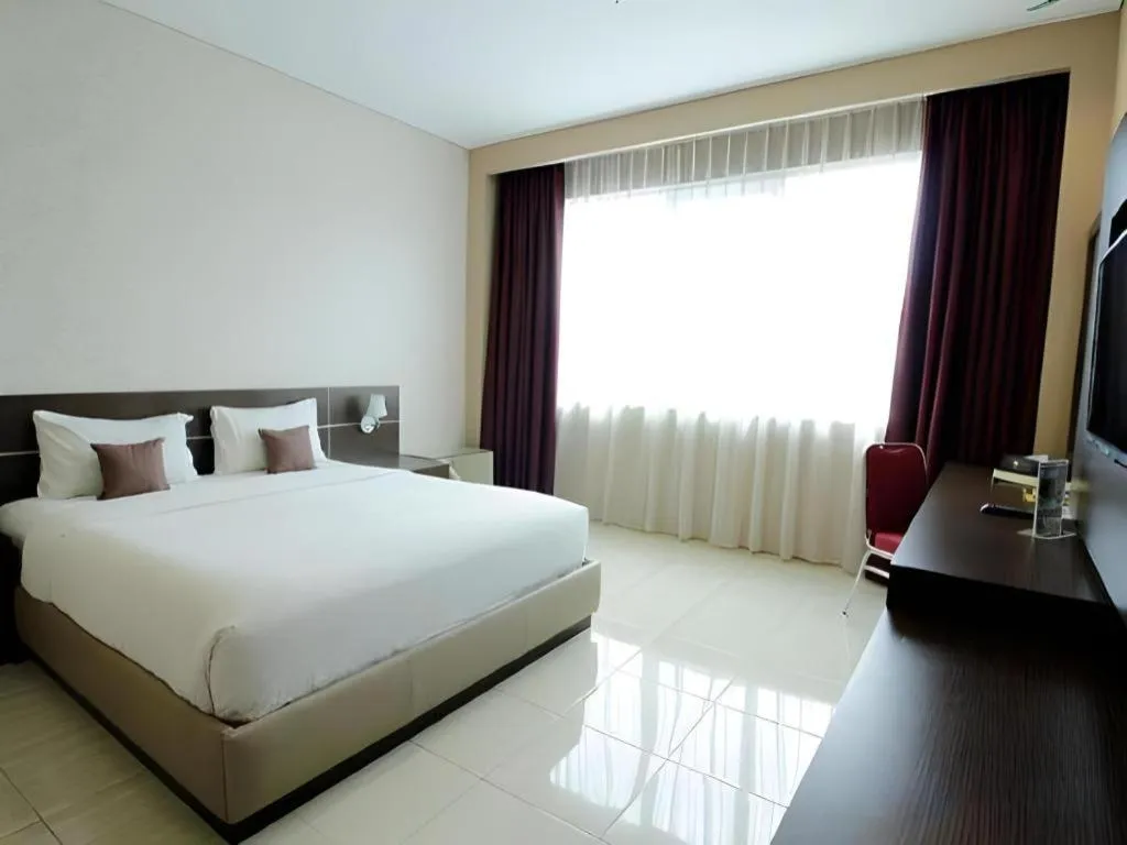 Bed in Asoka Luxury Hotel