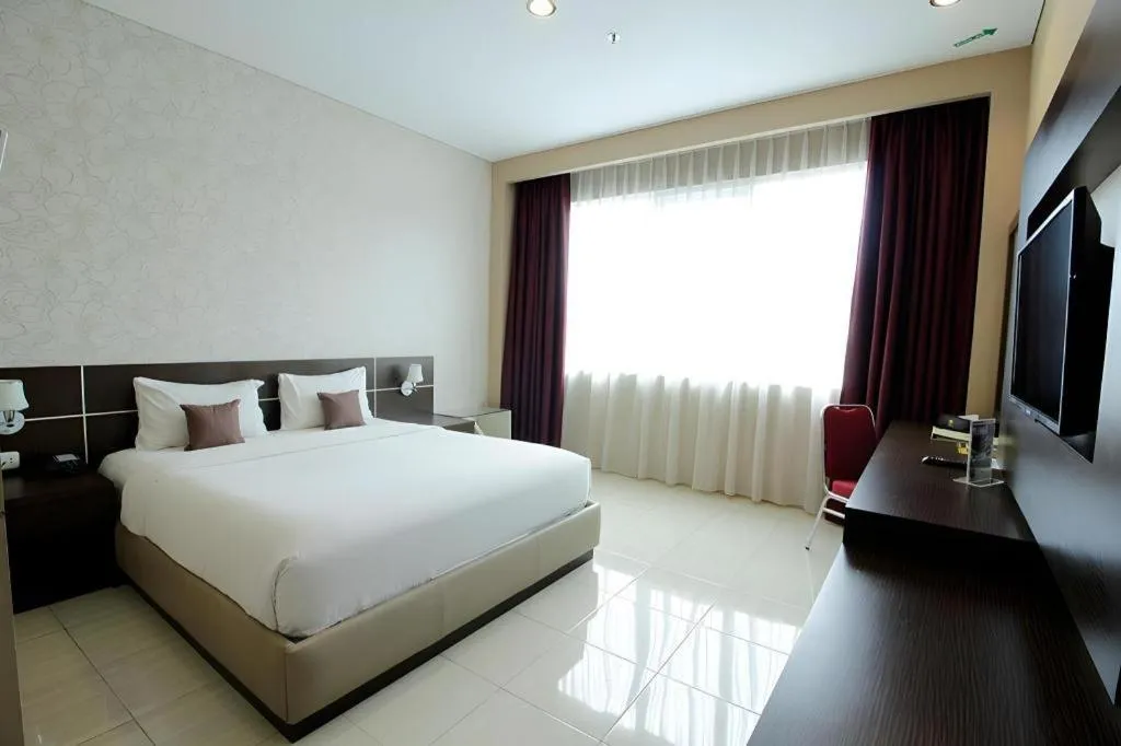 Bed in Asoka Luxury Hotel