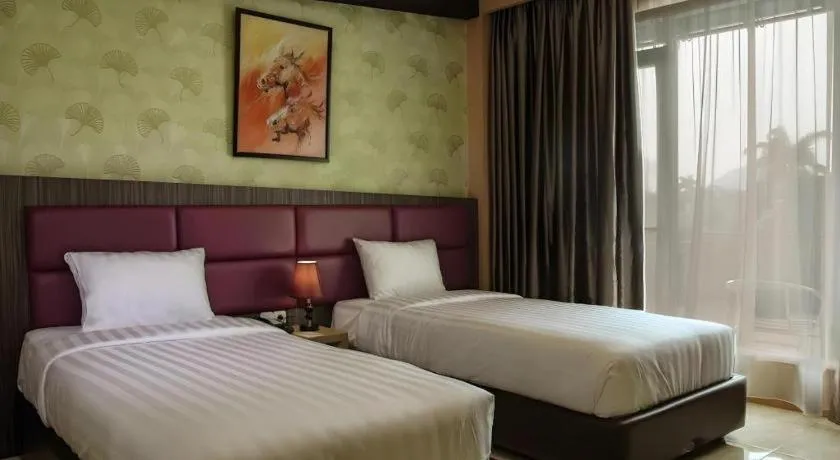 Bed in Asoka Luxury Hotel