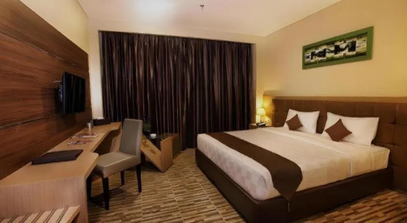 Bed in Asoka Luxury Hotel