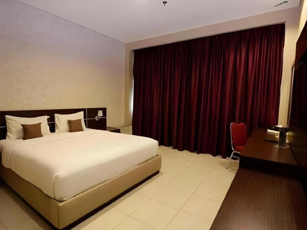 Bed in Asoka Luxury Hotel