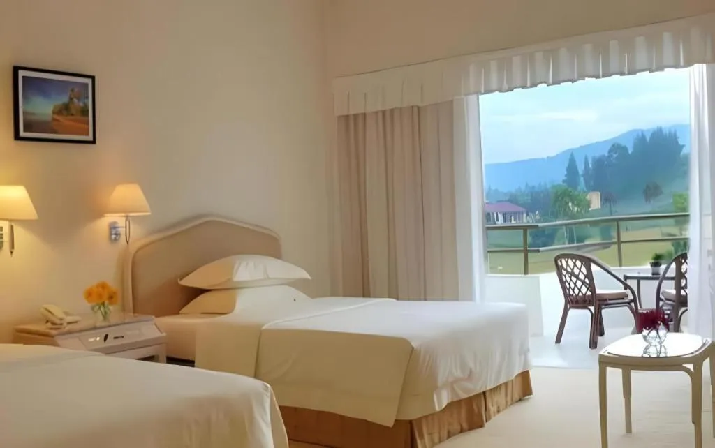 Bed in Grand Mutiara Hotel