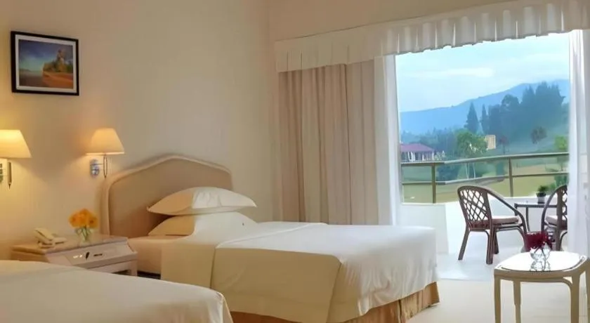 Bed in Grand Mutiara Hotel