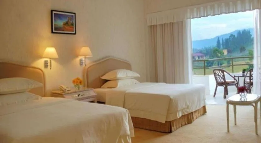 Bed in Grand Mutiara Hotel