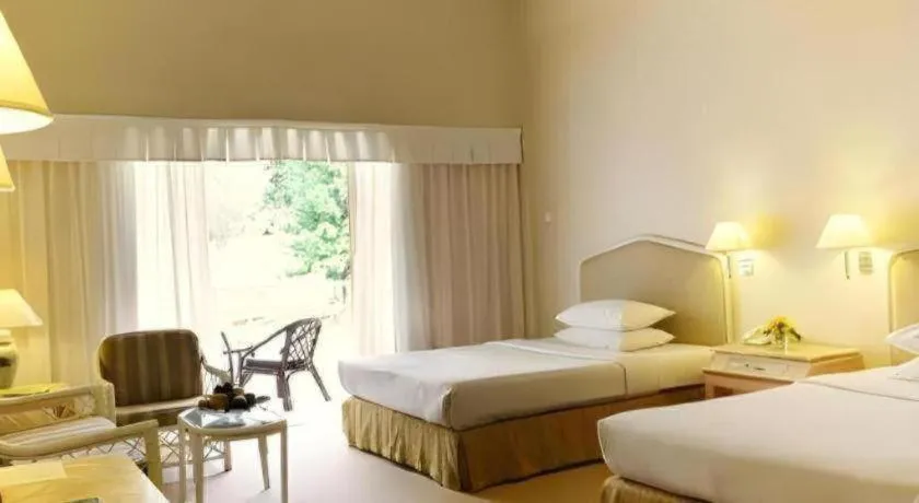 Bed in Grand Mutiara Hotel