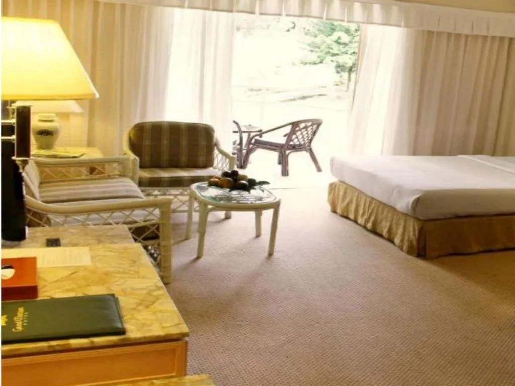 Bed in Grand Mutiara Hotel