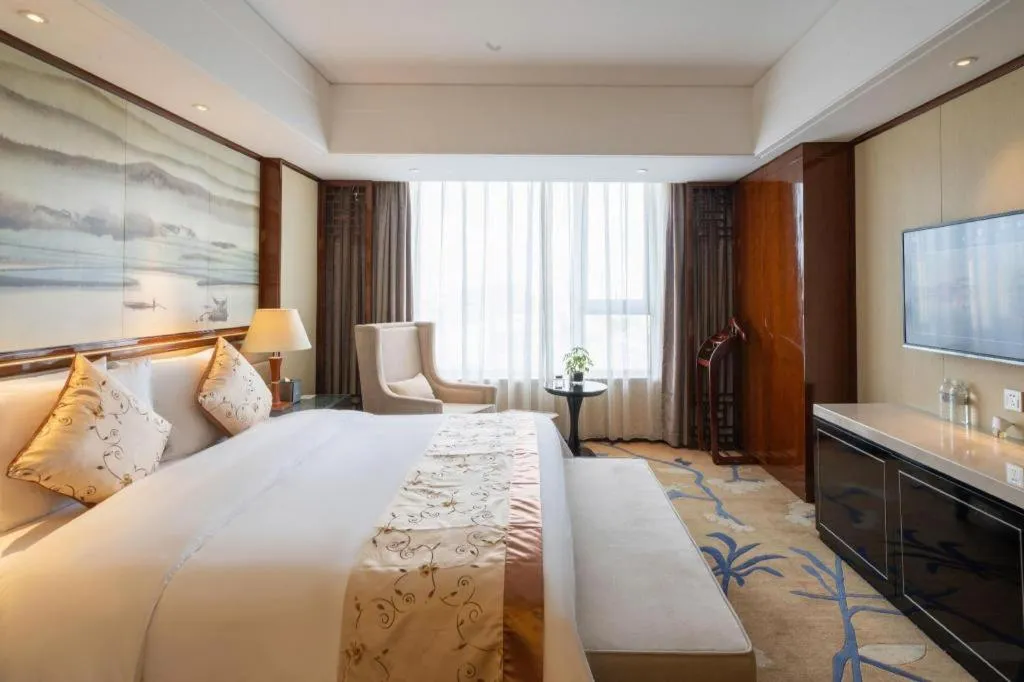 Bed in Yang Peng Jin Jiang Hotel