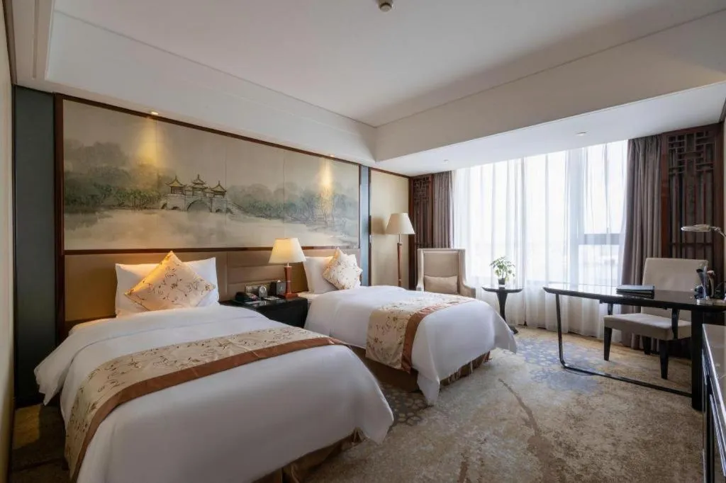 Bed in Yang Peng Jin Jiang Hotel