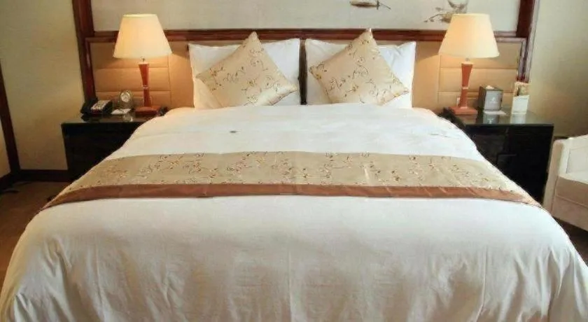 Bed in Yang Peng Jin Jiang Hotel