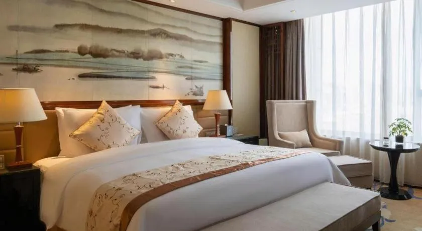 Bed in Yang Peng Jin Jiang Hotel