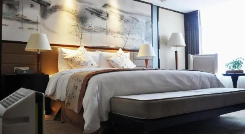 Bed in Yang Peng Jin Jiang Hotel