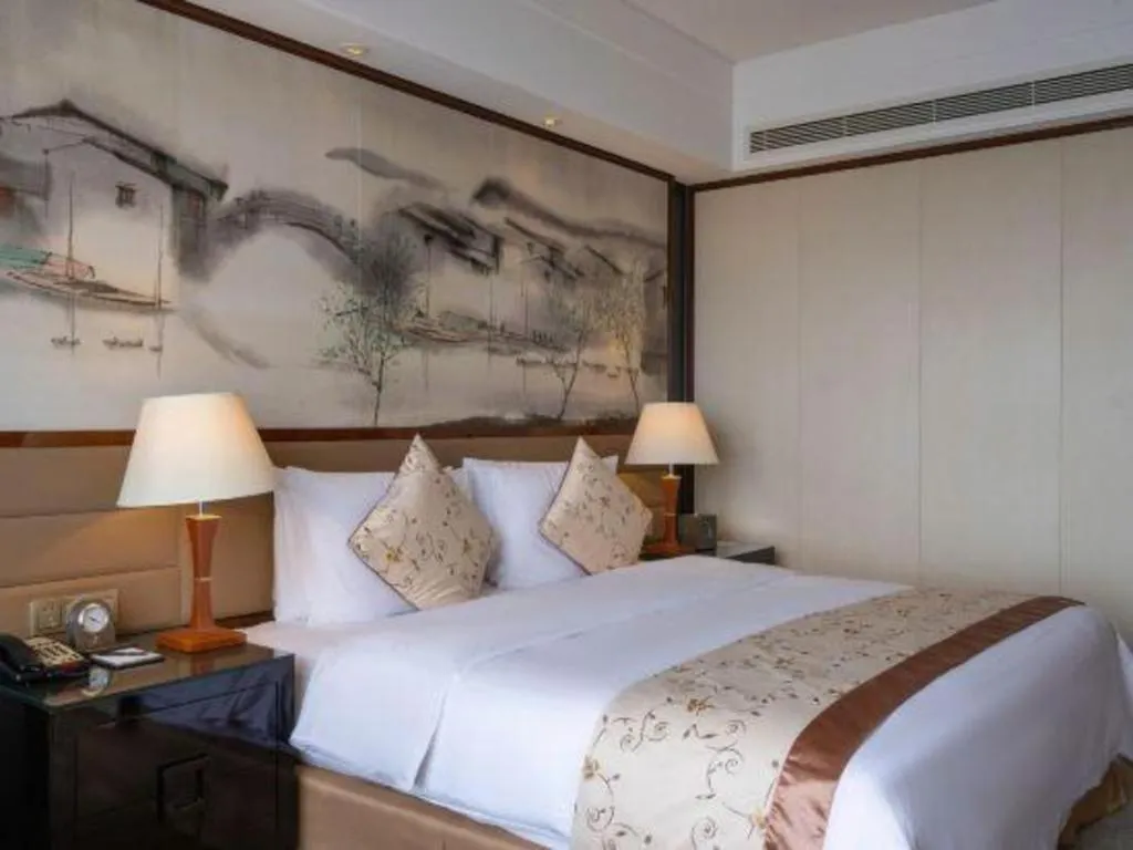 Bed in Yang Peng Jin Jiang Hotel