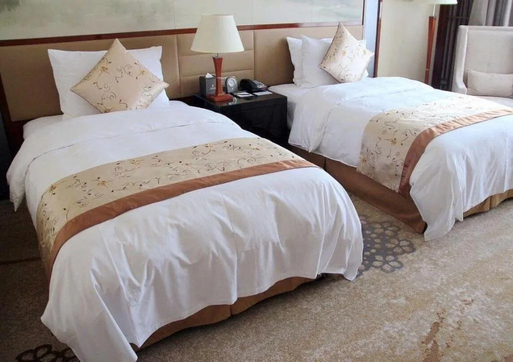 Bed in Yang Peng Jin Jiang Hotel