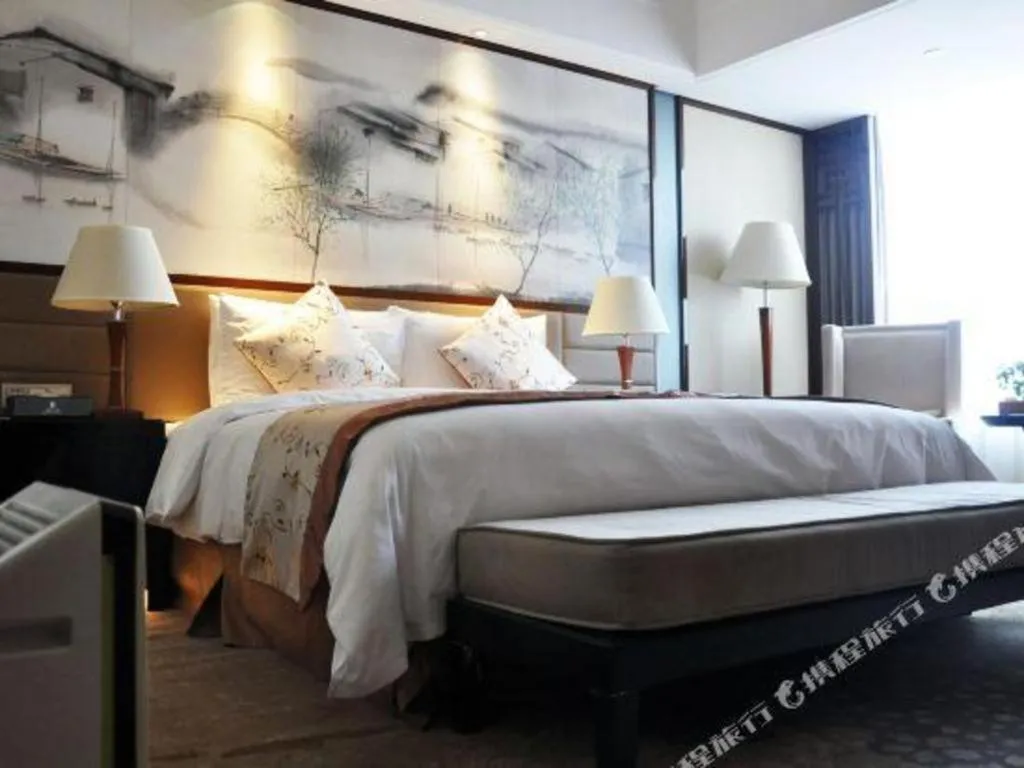 Bed in Yang Peng Jin Jiang Hotel