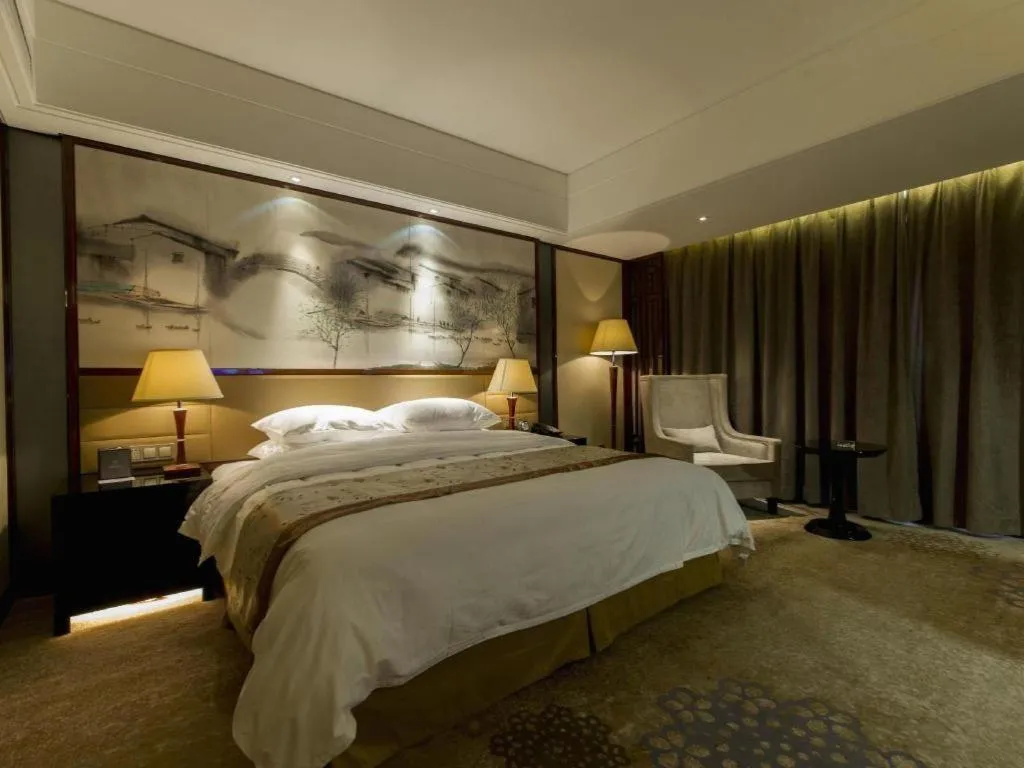 Bed in Yang Peng Jin Jiang Hotel