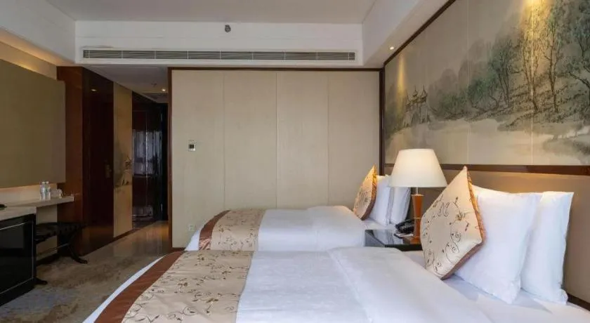Bed in Yang Peng Jin Jiang Hotel
