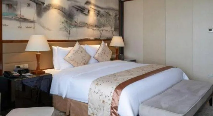 Bed in Yang Peng Jin Jiang Hotel