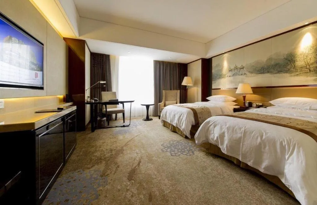 Bed in Yang Peng Jin Jiang Hotel