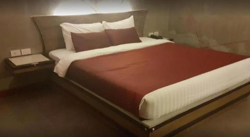 Bed in Loft Living Hotel Khonkaen