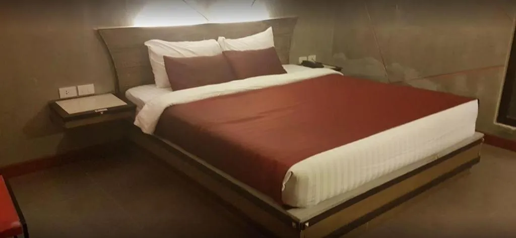 Bed in Loft Living Hotel Khonkaen