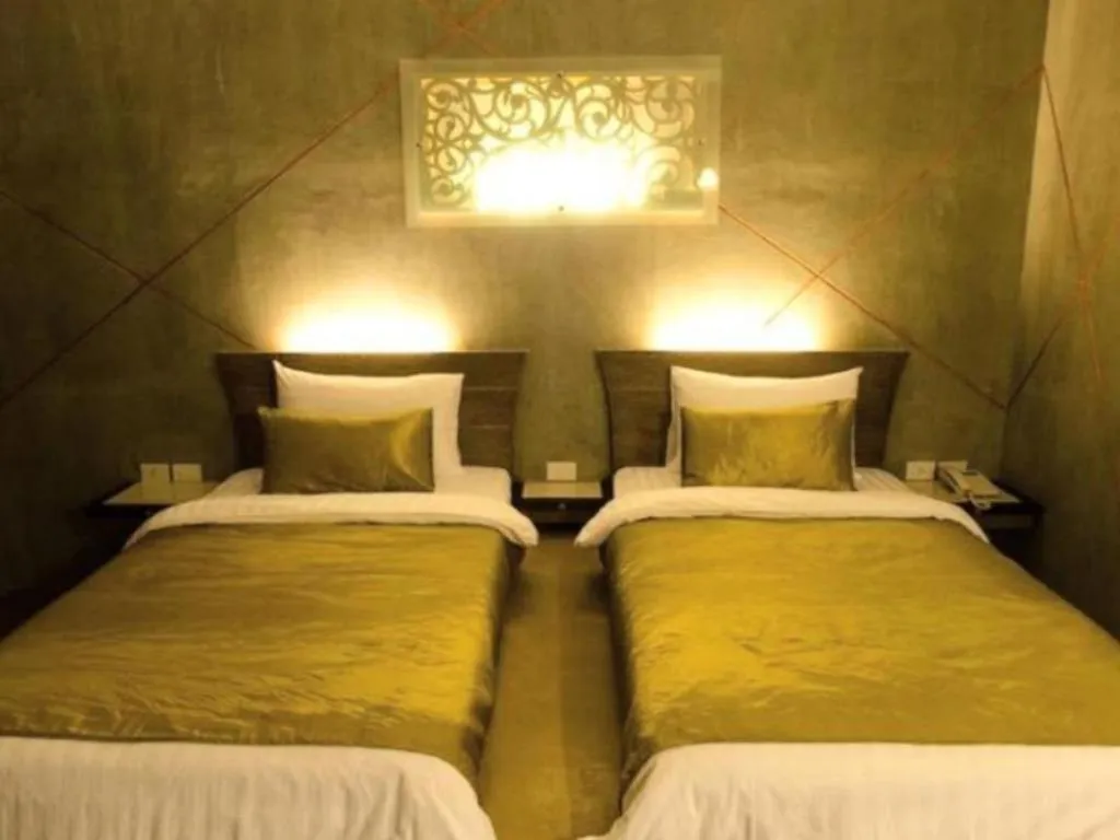 Bed in Loft Living Hotel Khonkaen