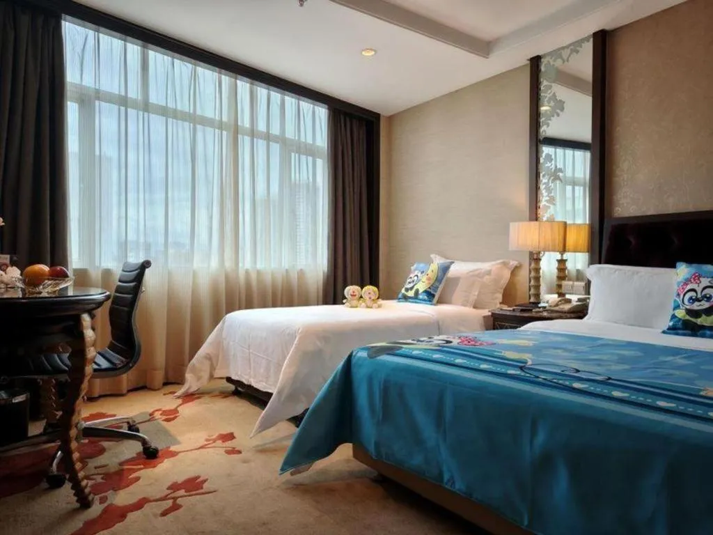 Bed in Dongguan Silver World Garden Hotel