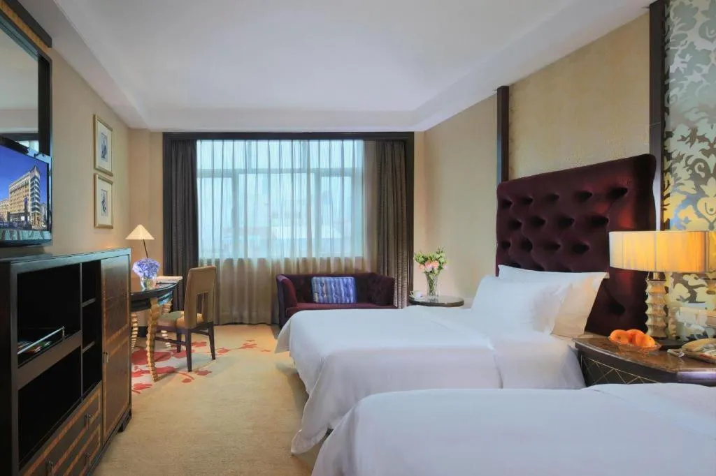 Bed in Dongguan Silver World Garden Hotel