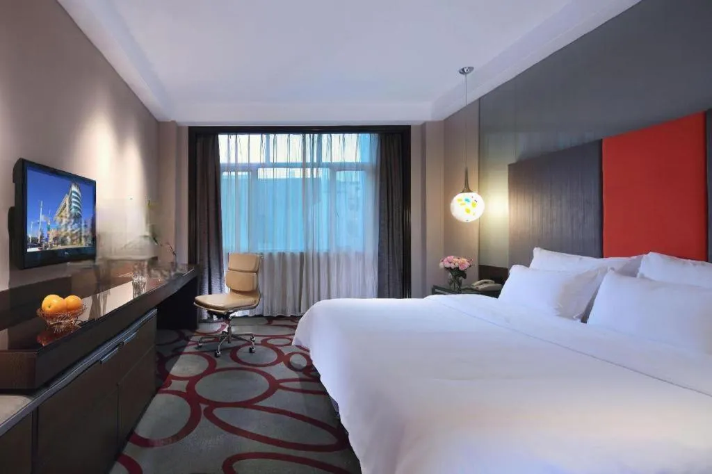 Bed in Dongguan Silver World Garden Hotel