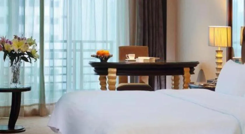 Bed in Dongguan Silver World Garden Hotel