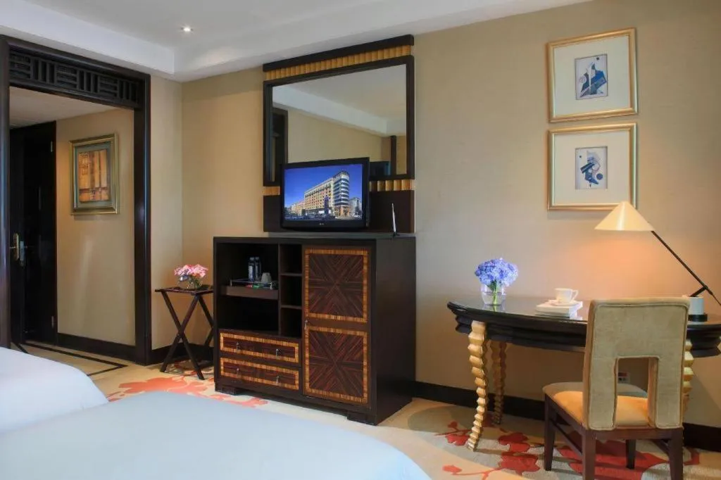 Bed in Dongguan Silver World Garden Hotel