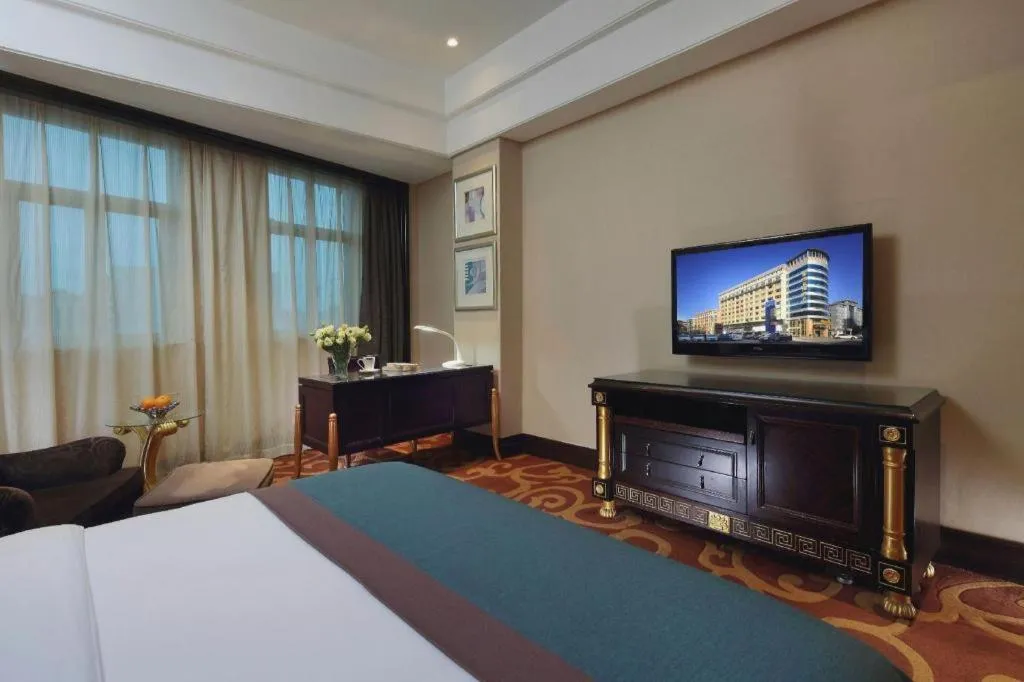Bed in Dongguan Silver World Garden Hotel