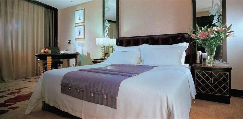 Bed in Dongguan Silver World Garden Hotel