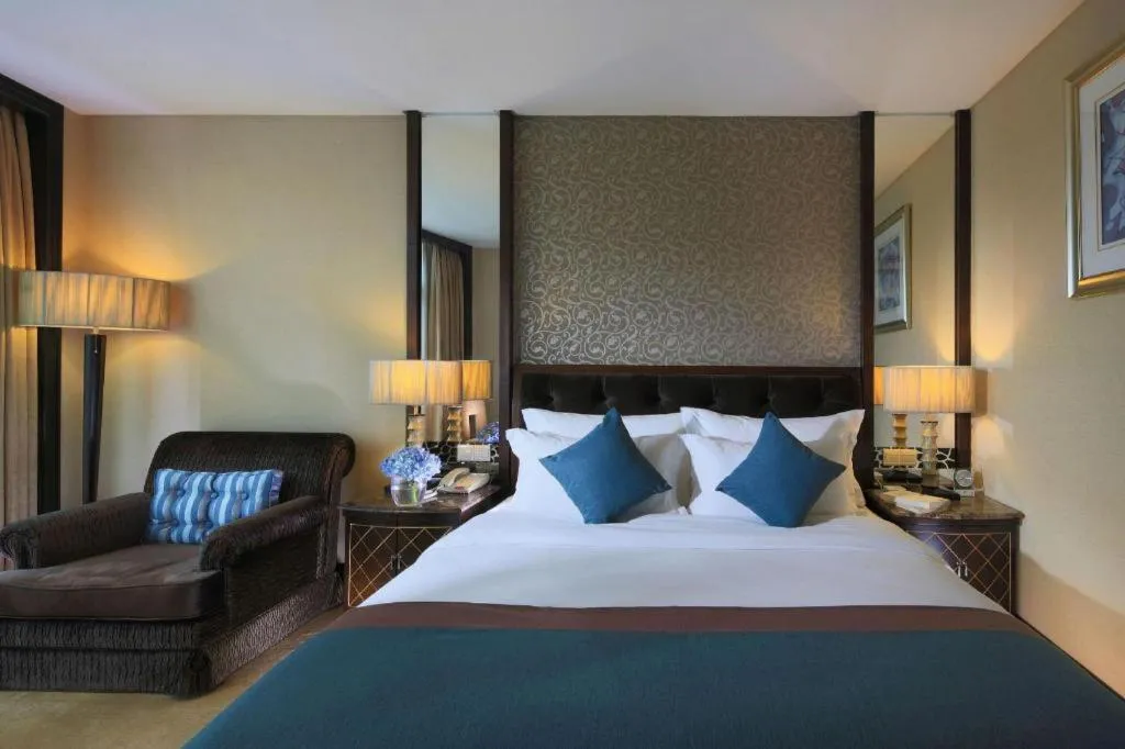 Bed in Dongguan Silver World Garden Hotel