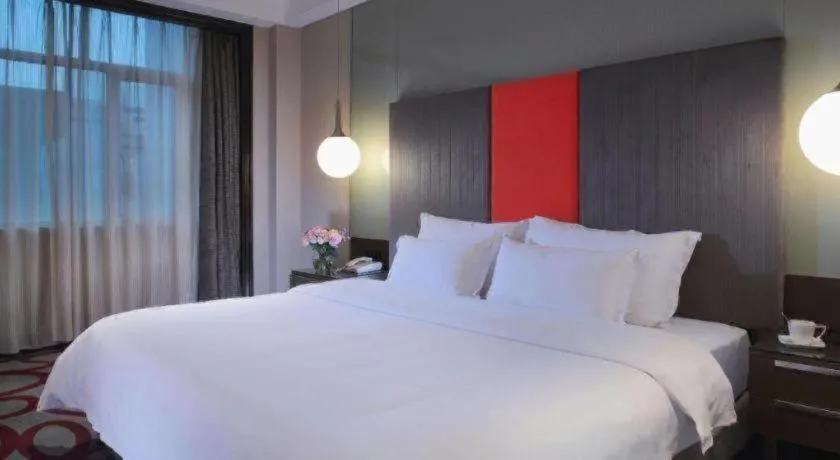 Bed in Dongguan Silver World Garden Hotel