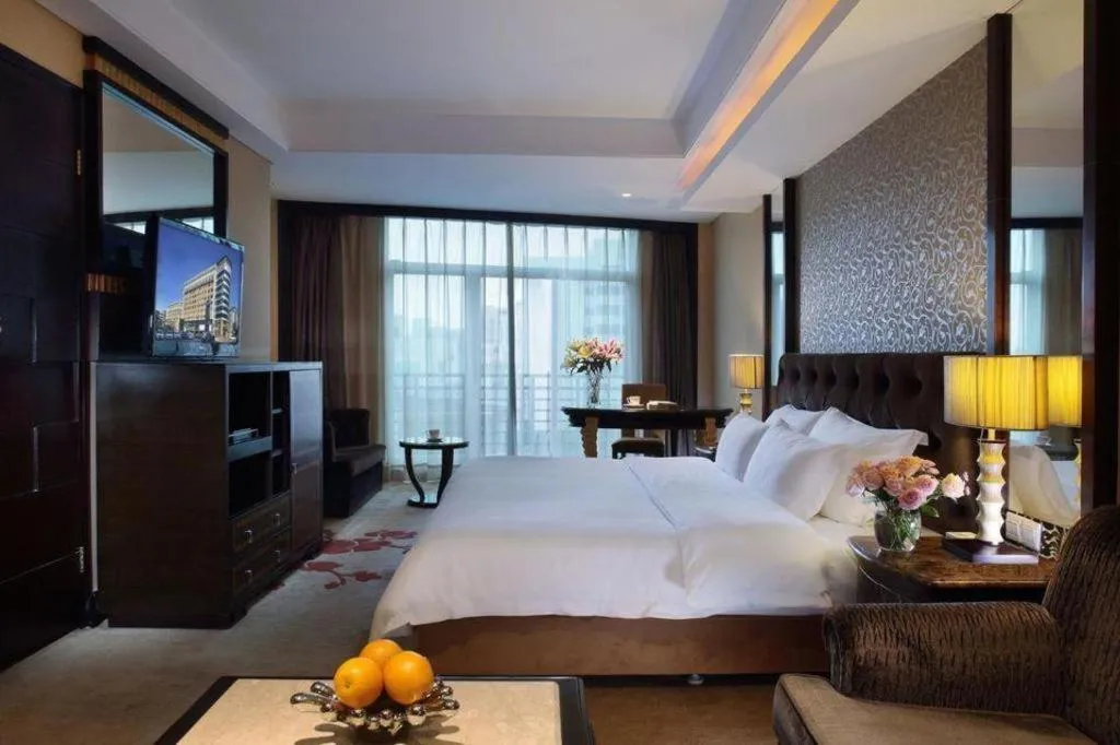 Bed in Dongguan Silver World Garden Hotel