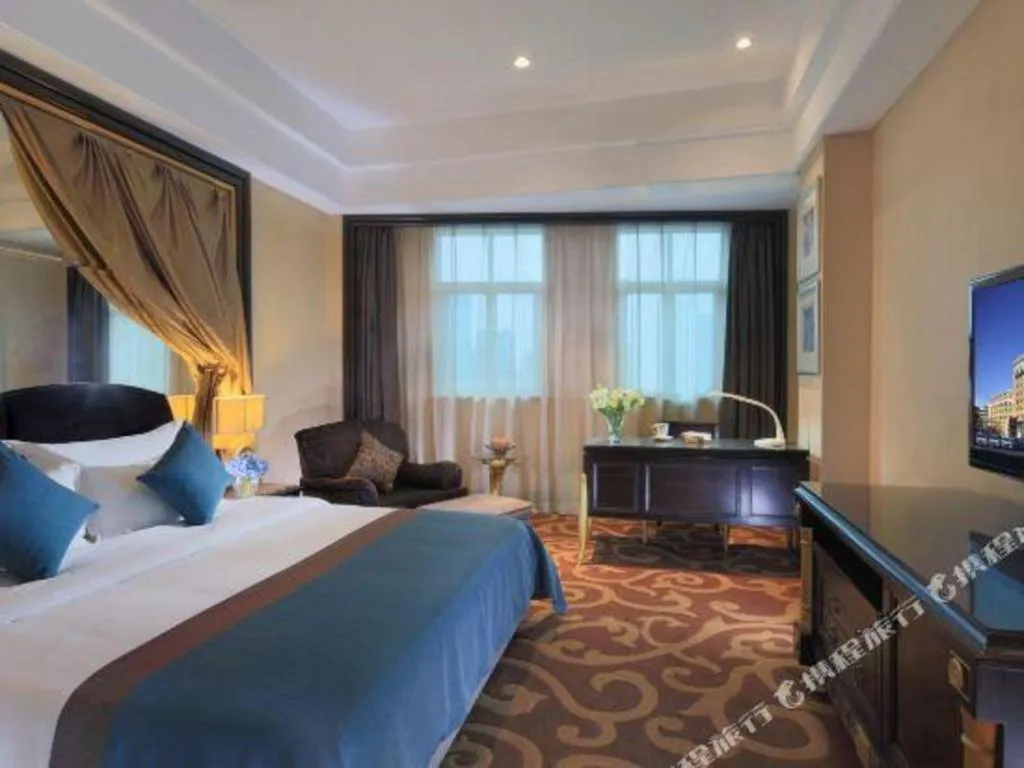 Bed in Dongguan Silver World Garden Hotel