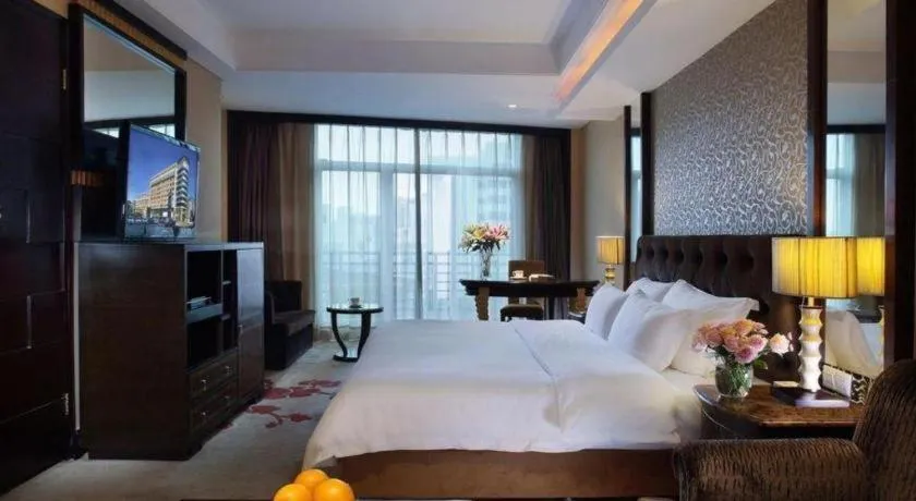 Bed in Dongguan Silver World Garden Hotel
