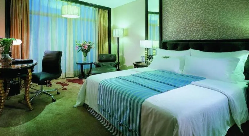 Bed in Dongguan Silver World Garden Hotel