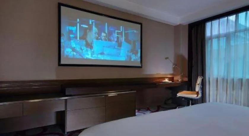 Bed in Dongguan Silver World Garden Hotel